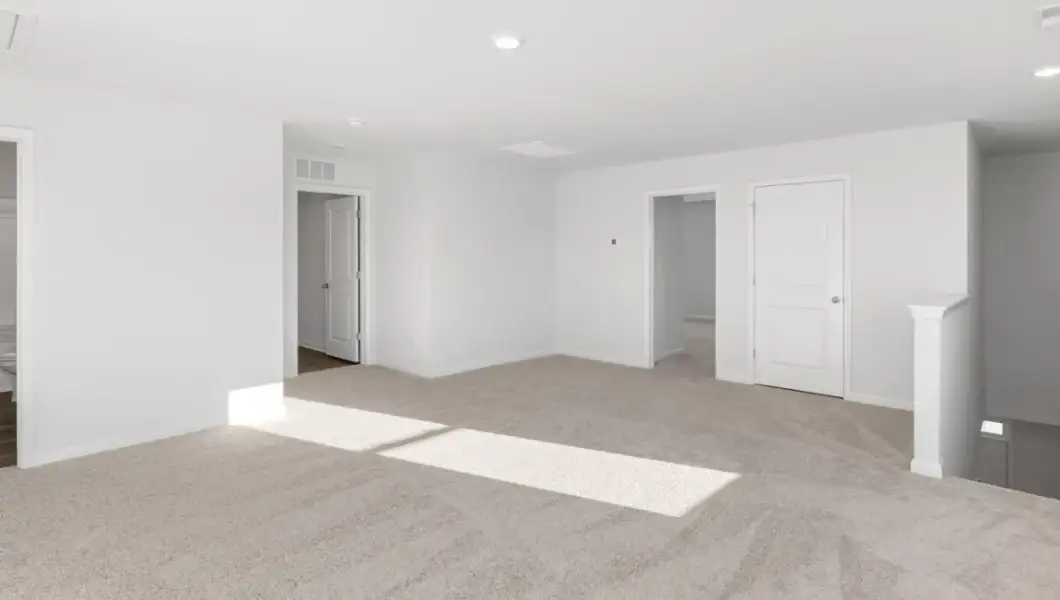 Representative unfurnished interior of a home built from the Robie by D.R. Horton in Saunders Village, Northwest (Image 17).