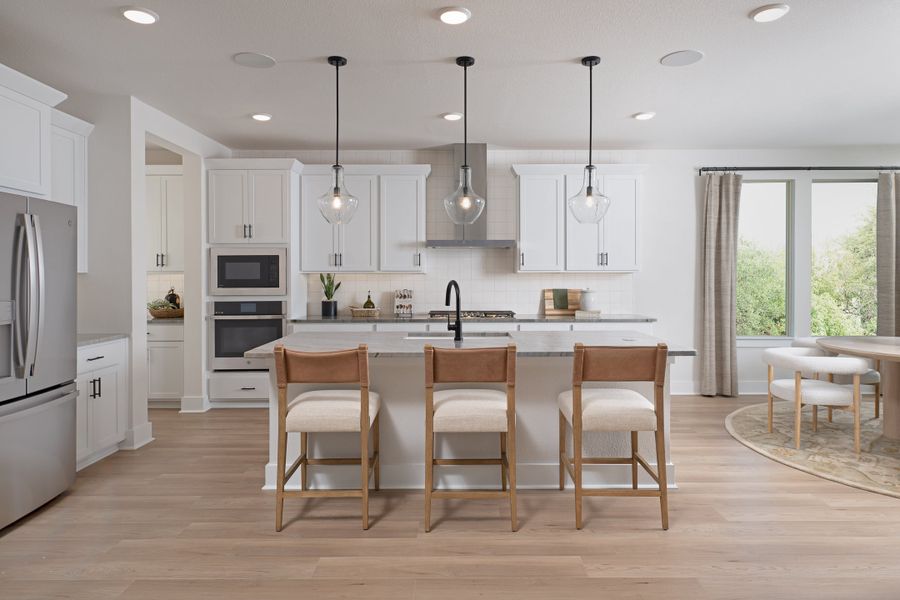 Representative furnished interior of a home built from the Owen by Tri Pointe Homes in Somerset Park, Rockwall (Image 6).
