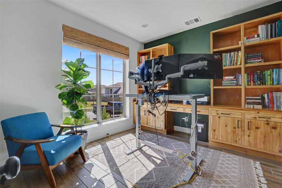 Yes this is a dedicated office with incredible built ins.  Better than new construction