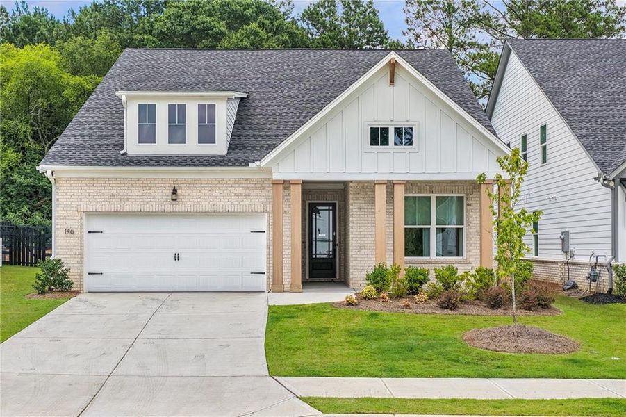 Front exterior of a new home in , Woodstock, GA, highlighting curb appeal (Image 1). Front exterior of a new home in , Woodstock, GA, highlighting curb appeal (Image 1).
