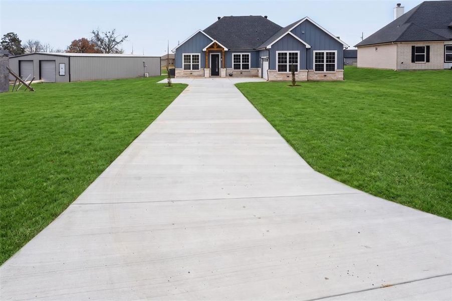 Front exterior of a new home in , Trinidad, TX, highlighting curb appeal (Image 25).