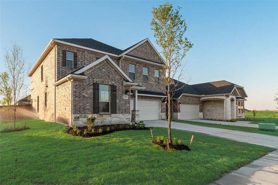Front exterior of a new home in Walden Pond, Forney, TX, highlighting curb appeal (Image 19).