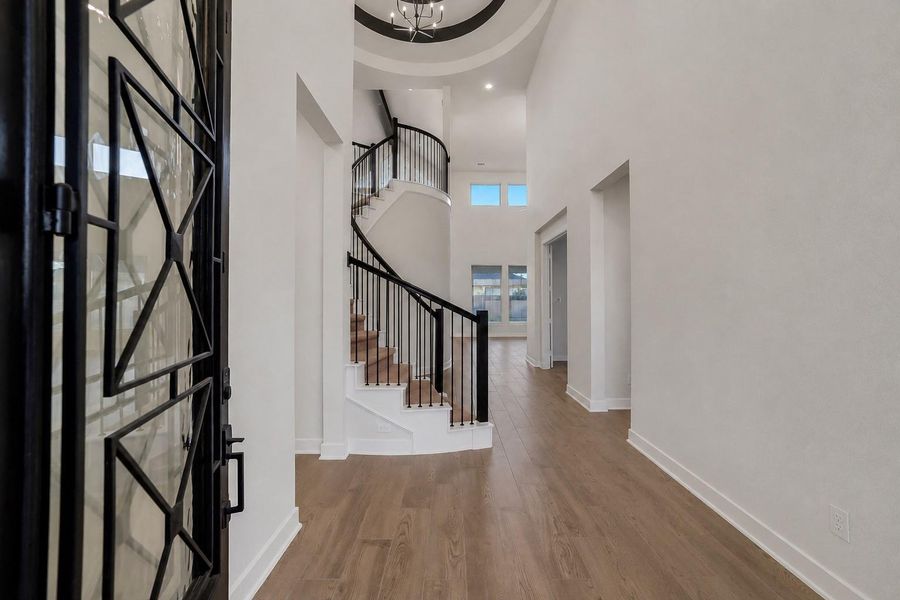 Spacious, unfurnished interior of a new home in Meridiana, Manvel (Image 39).
