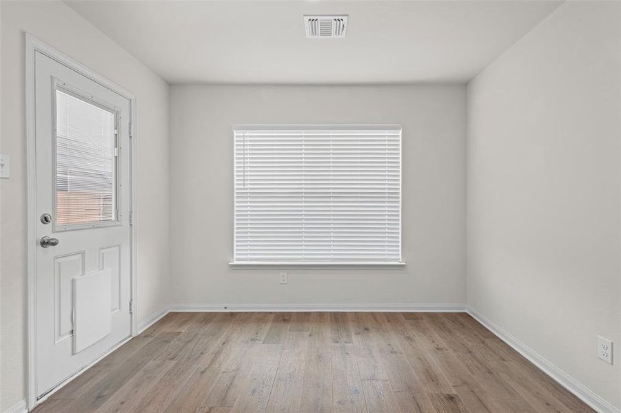 Breakfast area with door to covered patio