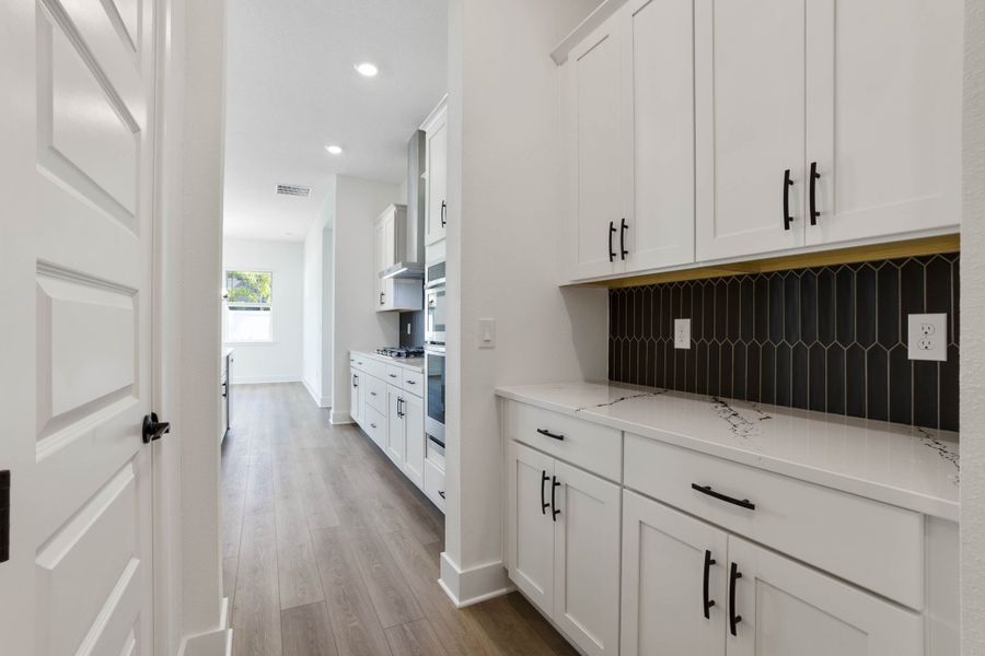 Representative furnished interior of a home built from the Hemingway by Rockwell Homes in Northlake At Ovation, Winter Garden (Image 10).