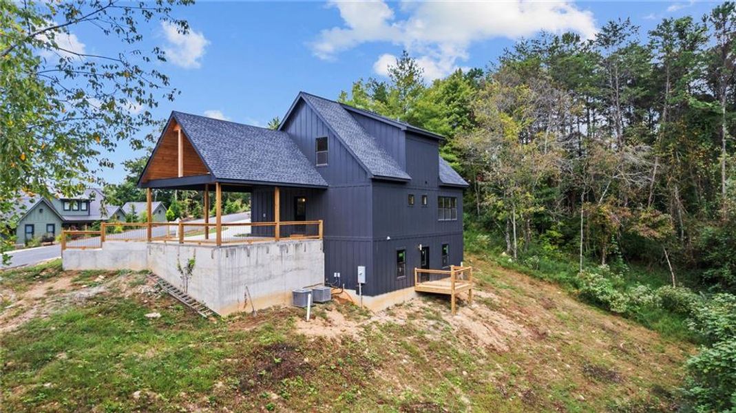 Exterior details and patio area of a home in , Ellijay (Image 30).
