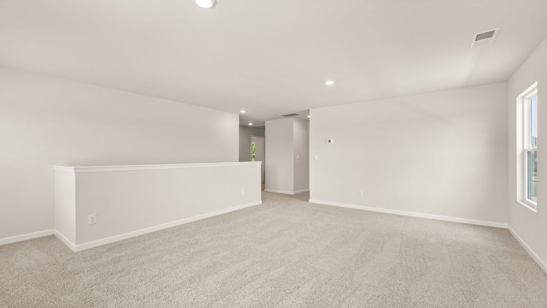 Representative unfurnished interior of a home built from the Elle by D.R. Horton in Preserve at Dove Creek, Statham (Image 22).
