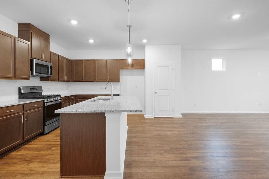Representative furnished interior of a home built from the Norcross by Taylor Morrison in Windance Lake, Loganville (Image 4).