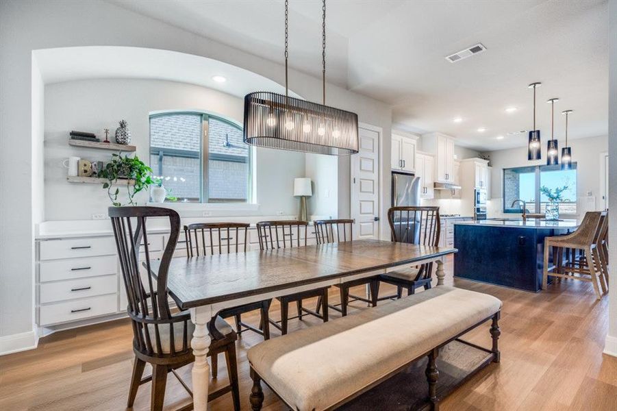 Dining room featuring light wood-style floors and recessed lighting