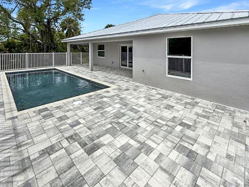Exterior details and patio area of a home in , Port Charlotte (Image 3).
