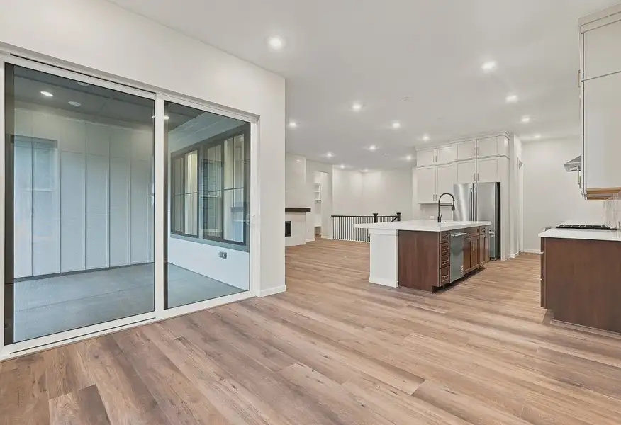 Homesite 67 Dining, Patio, Kitchen + Great Room - 9 of 21 Homesite 67 Dining, Patio, Kitchen + Great Room - 9 of 21