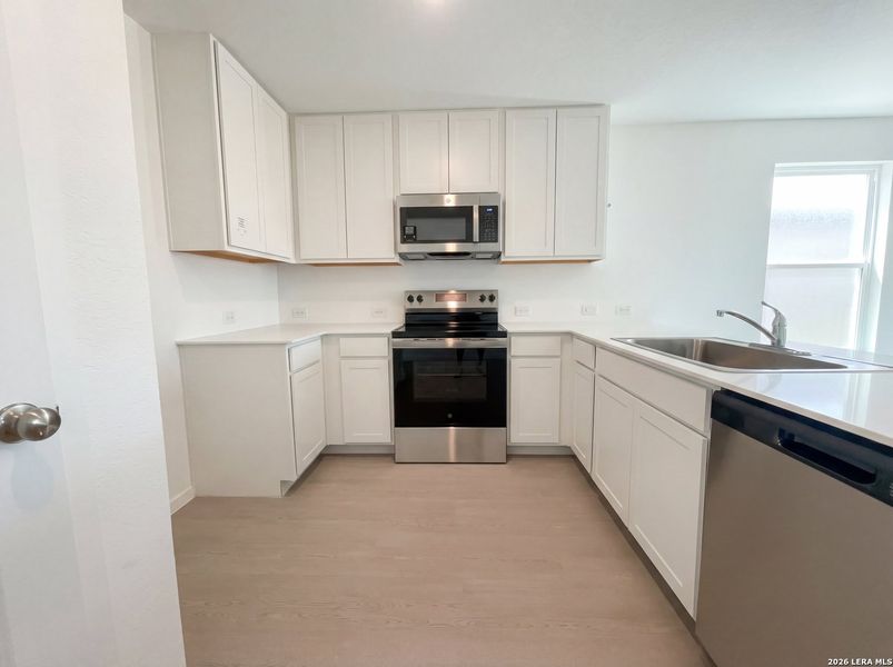 Furnished interior view inside a new home in Waters Edge, Seguin (Image 4).