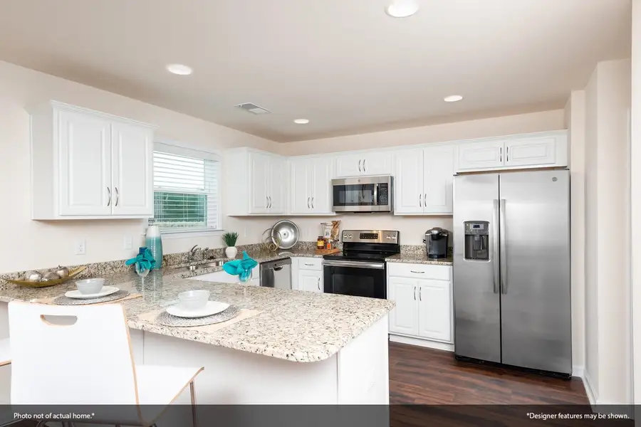 Furnished interior view inside a new home in Cambridge Reserve, Angier (Image 4).