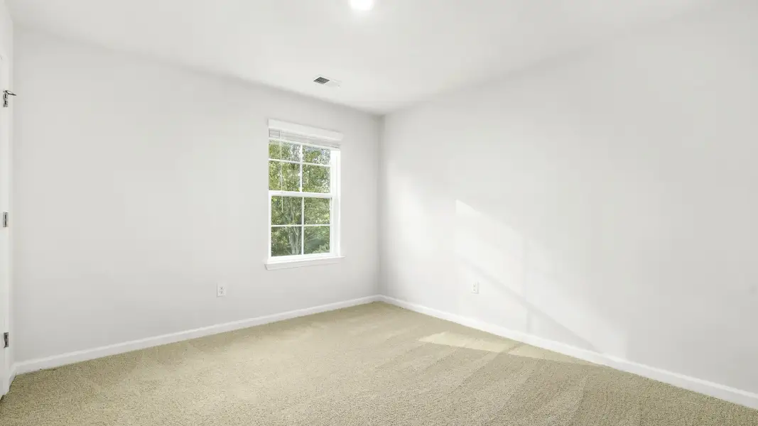 Spacious, unfurnished interior of a new home in Neal Place, Stokesdale (Image 22).