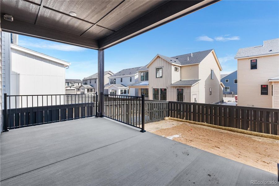 Exterior details and patio area of a home in Stargaze at Solstice, Littleton (Image 3).