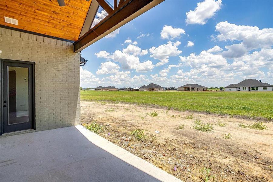 View of yard with a patio area