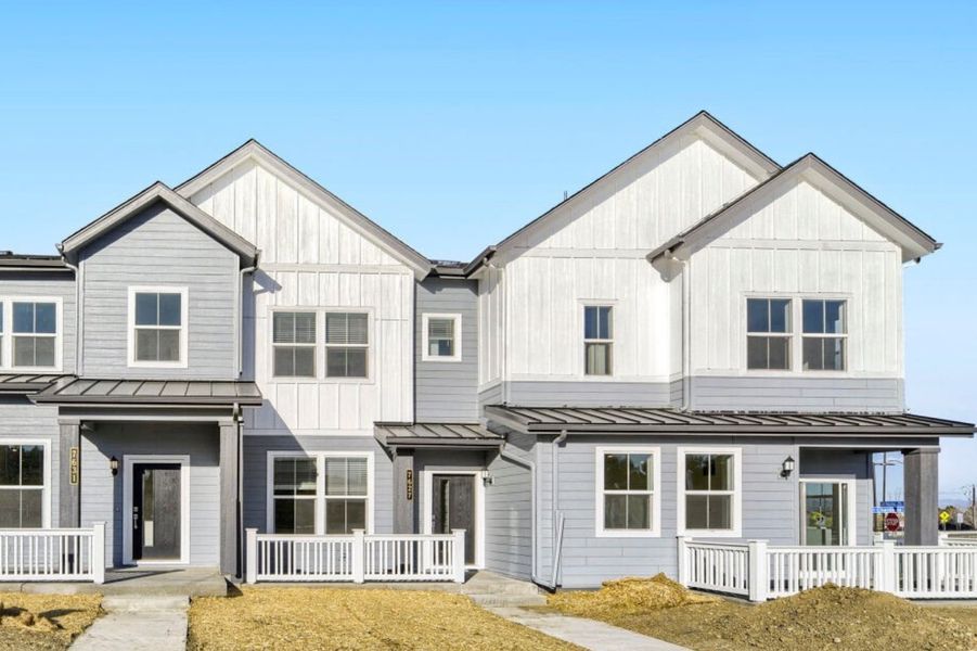 Front exterior of a new home in Vermilion Creek, Centennial, CO, highlighting curb appeal (Image 1). Front exterior of a new home in Vermilion Creek, Centennial, CO, highlighting curb appeal (Image 1).