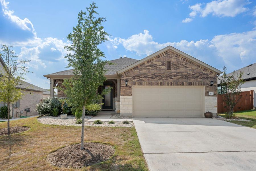 Ranch-style house with brick siding, driveway, an attached garage, and roof with shingles Ranch-style house with brick siding, driveway, an attached garage, and roof with shingles