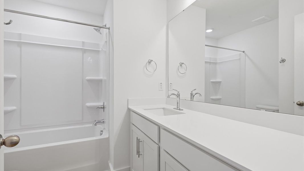 Accomplished full bath designed with both comfort and sophistication in mind near Downtown Greenville Accomplished full bath designed with both comfort and sophistication in mind near Downtown Greenville