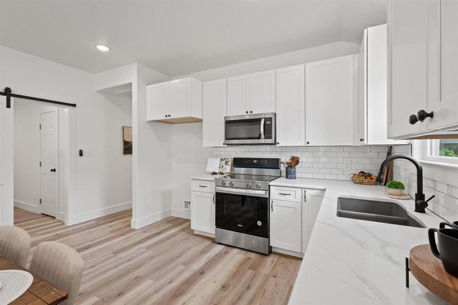 Furnished interior view inside a new home in , Wolfe City (Image 16). Furnished interior view inside a new home in , Wolfe City (Image 16).