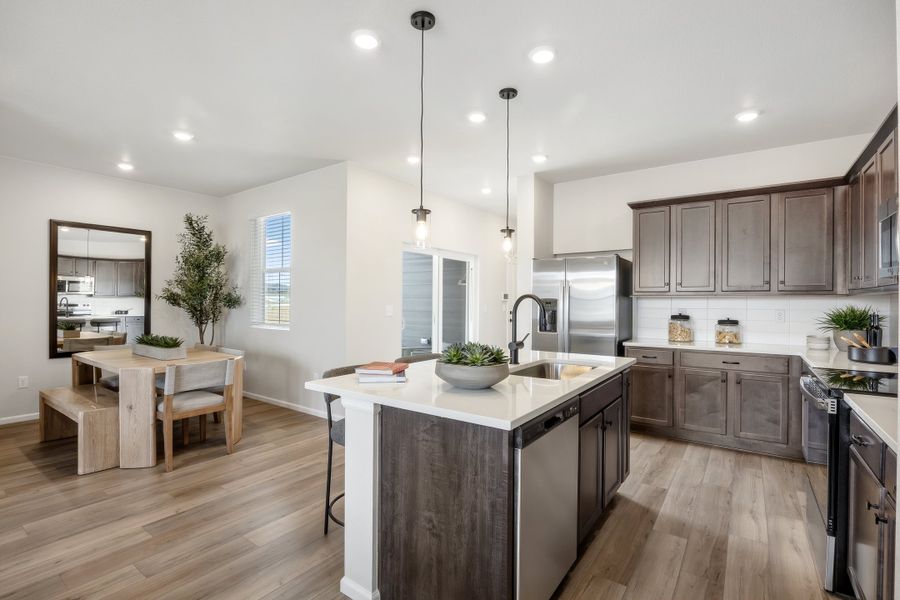 Representative furnished interior of a home built from the 2503 by Risewell Homes in Harvest Crossing, Aurora (Image 14).