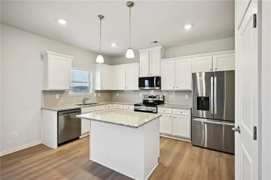 Furnished interior view inside a new home in The Hills at Cedar Creek, Winder (Image 26).