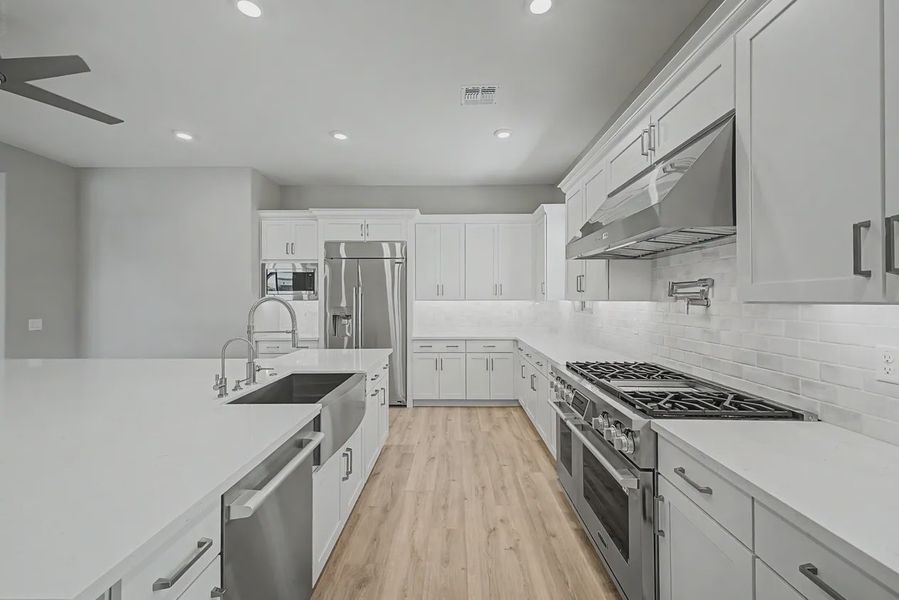Furnished interior view inside a new home in Bellero Estates, Queen Creek (Image 7).