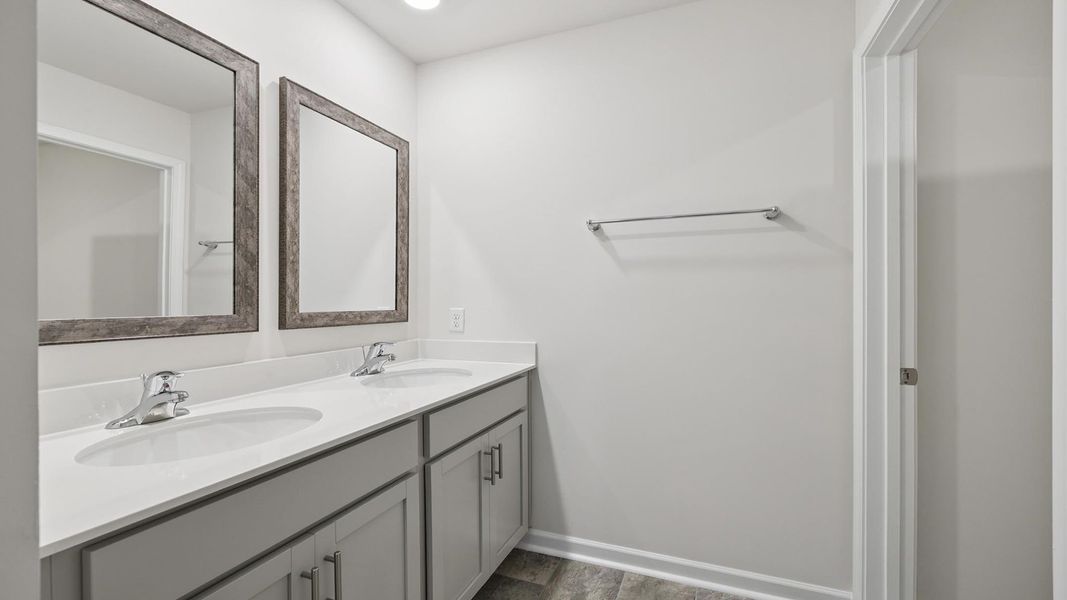Furnished interior view inside a new home in Lakestone, Woodruff (Image 12).