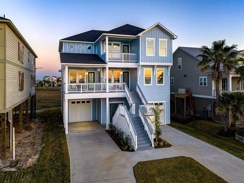 Front exterior of a new home in , Galveston, TX, highlighting curb appeal (Image 28). Front exterior of a new home in , Galveston, TX, highlighting curb appeal (Image 28).
