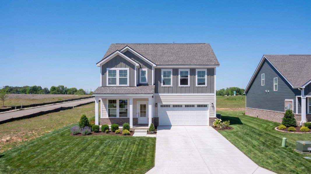 Front exterior with 2-car garage