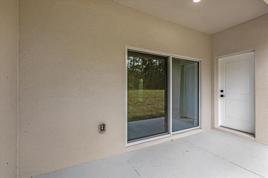 Exterior details and patio area of a home in , Citrus Springs (Image 23).