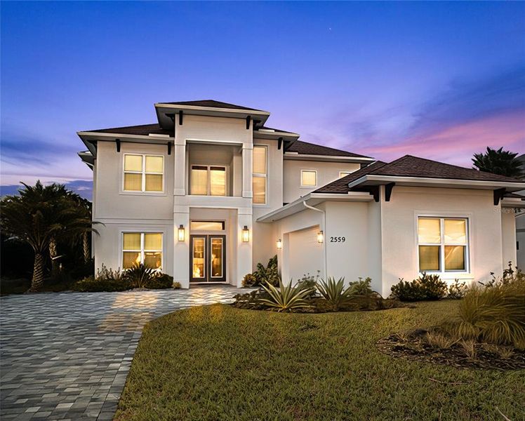 Front exterior of a new home in , Flagler Beach, FL, highlighting curb appeal (Image 2).