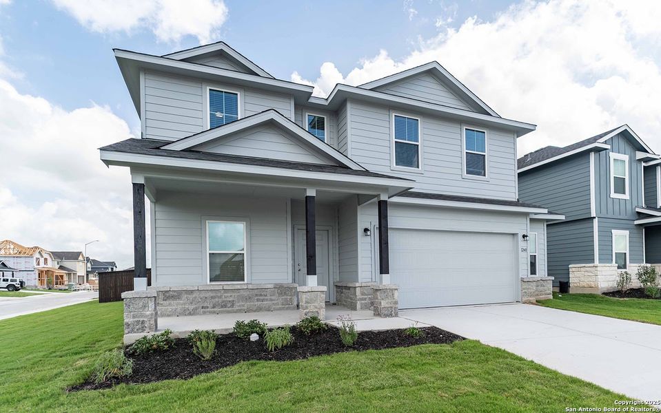 Front exterior of a new home in Swenson Heights, Seguin, TX, highlighting curb appeal (Image 2).