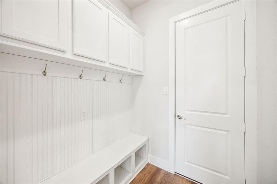 Mudroom featuring dark hardwood / wood-style floors