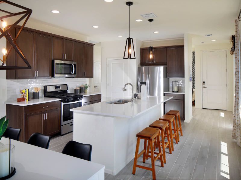 The open concept kitchen and living areas allow you to host friends and family with ease.