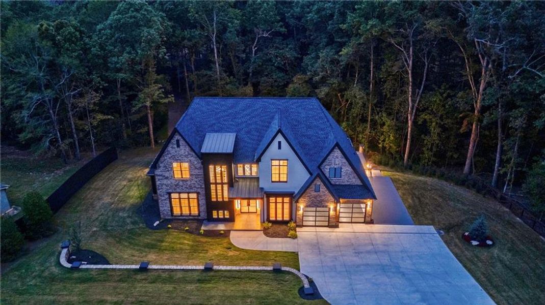 Front exterior of a new home in , Loganville, GA, highlighting curb appeal (Image 38). Front exterior of a new home in , Loganville, GA, highlighting curb appeal (Image 38).