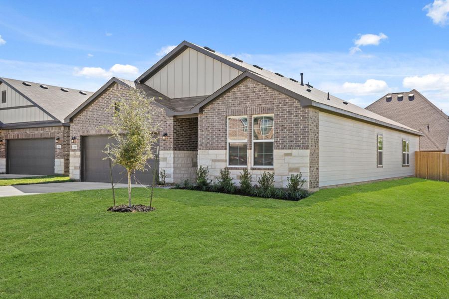 Front exterior of a new home in Lexington Heights, Willis, TX, highlighting curb appeal (Image 2). Front exterior of a new home in Lexington Heights, Willis, TX, highlighting curb appeal (Image 2).