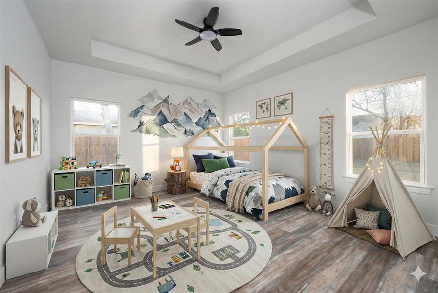 Virtually generated decoration. Bedroom with a tray ceiling, wood finished floors, and a ceiling fan