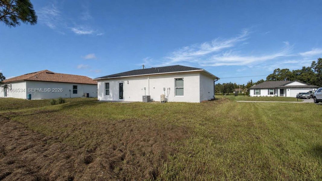 Exterior details and patio area of a home in , Lehigh Acres (Image 3).