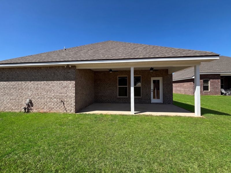 Exterior details and patio area of a home in Young Oaks, Crestview (Image 4).