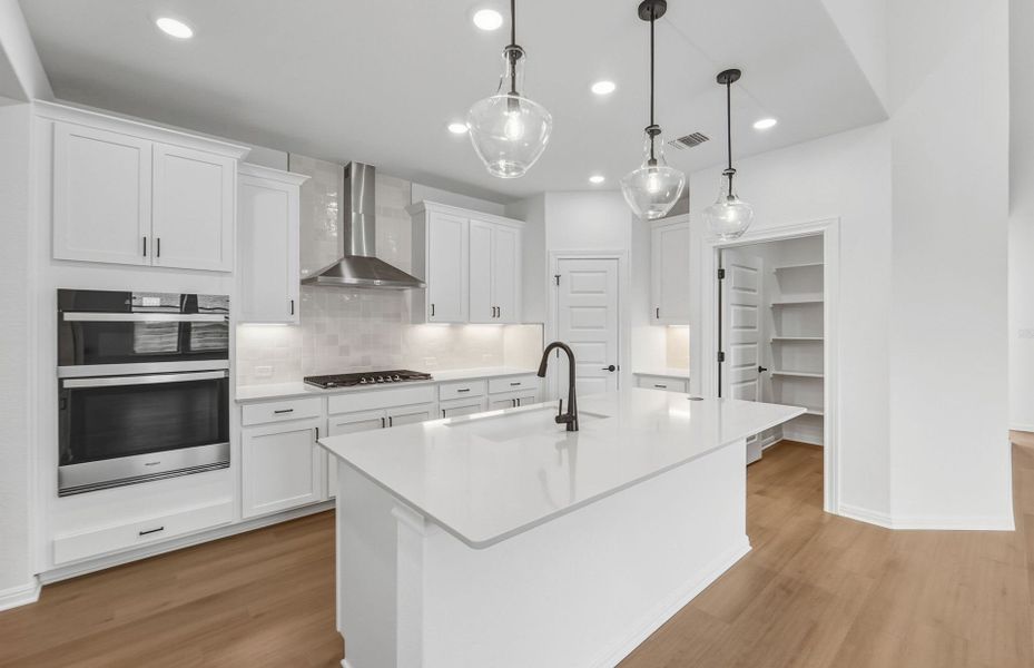 Furnished interior view inside a new home in Bluffview Reserve, Leander (Image 8).