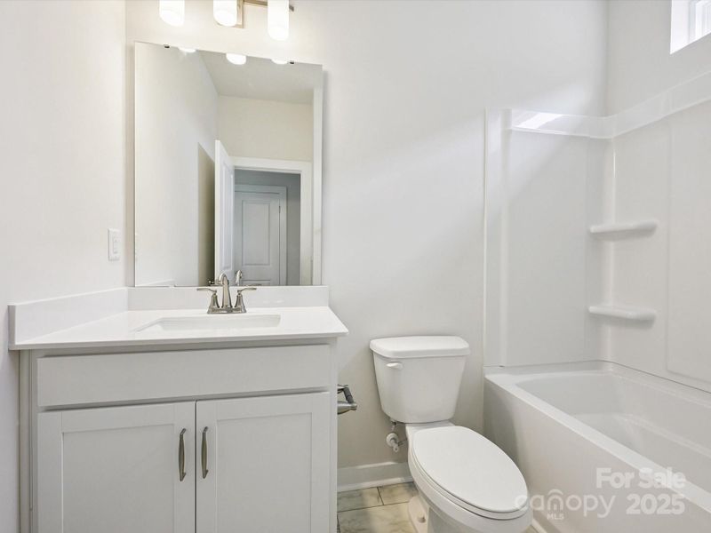 Furnished interior view inside a new home in Central Living at Craig, Charlotte (Image 14).