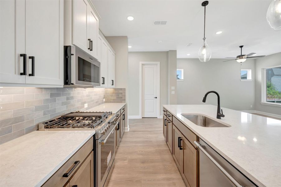 Furnished interior view inside a new home in Pomona - Grove Row Collection, Manvel (Image 8).