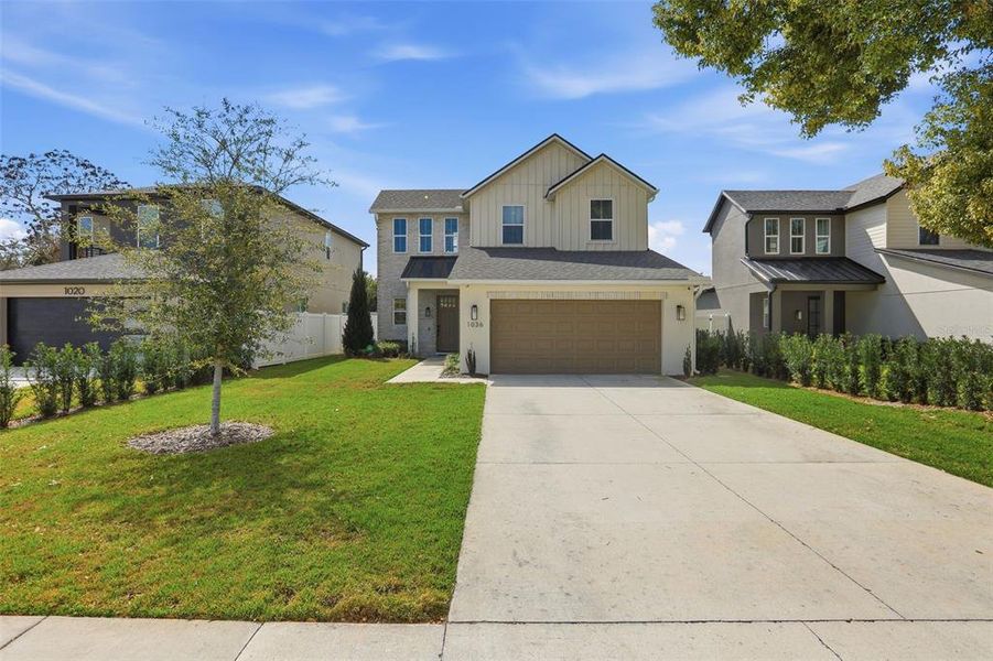 Front exterior of a new home in , Orlando, FL, highlighting curb appeal (Image 24). Front exterior of a new home in , Orlando, FL, highlighting curb appeal (Image 24).