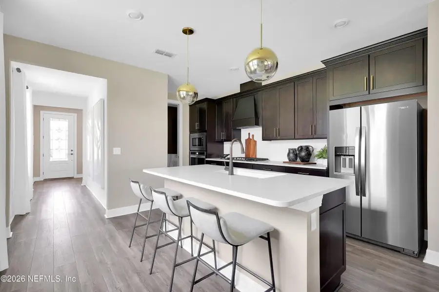 Furnished interior view inside a new home in Seminole Palms, Palm Coast (Image 4). Furnished interior view inside a new home in Seminole Palms, Palm Coast (Image 4).