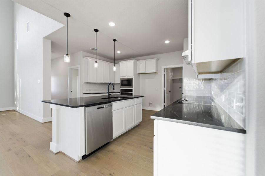 Furnished interior view inside a new home in The Woodlands at Medina Hills, Mico (Image 10).