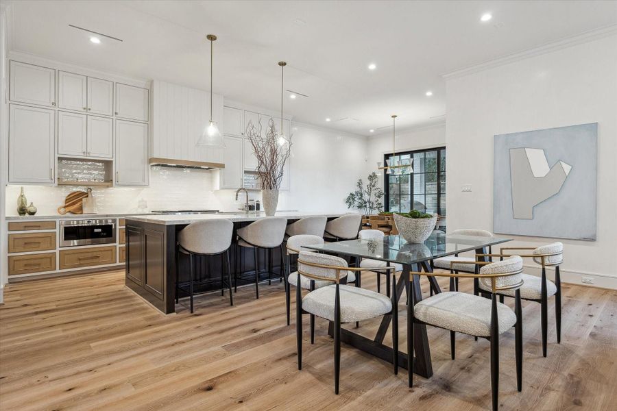 Use the central portion of the living space for a breakfast table or incorporate the area into the living room for even more space.