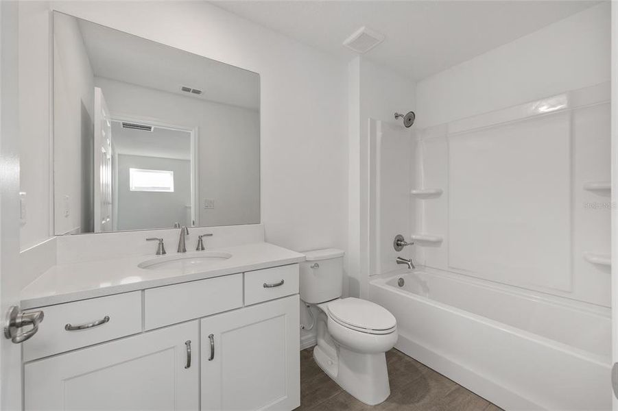 Furnished interior view inside a new home in Calesa Township, Ocala (Image 12).