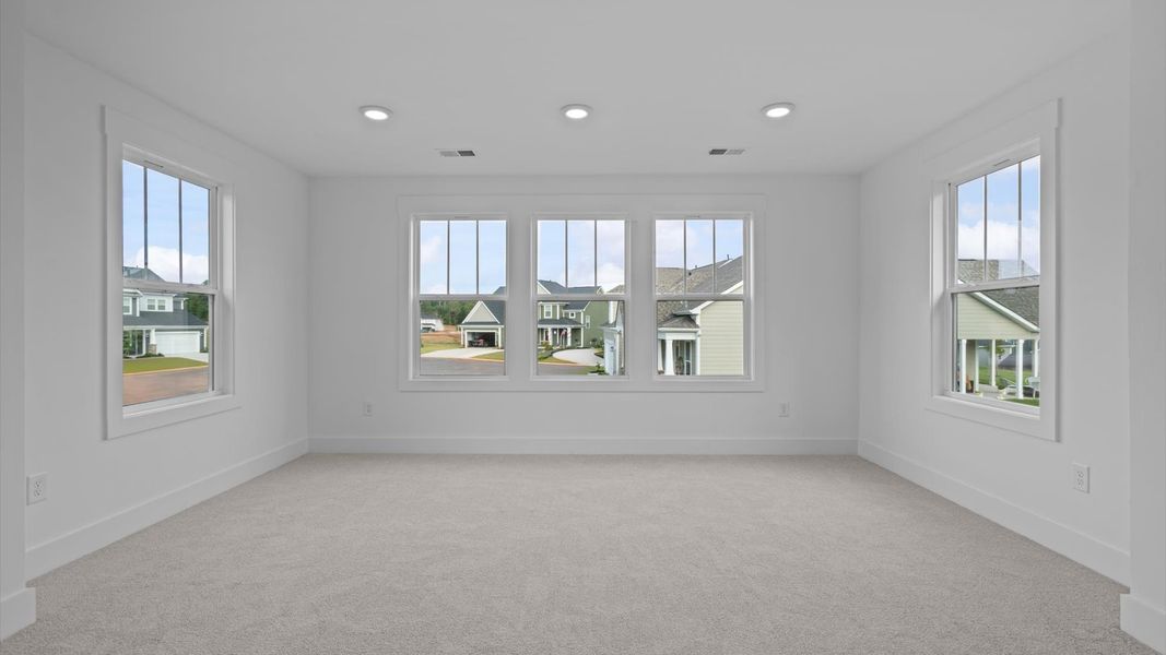 Primary suite that offers first-rate relaxation with established style and elevated finishes