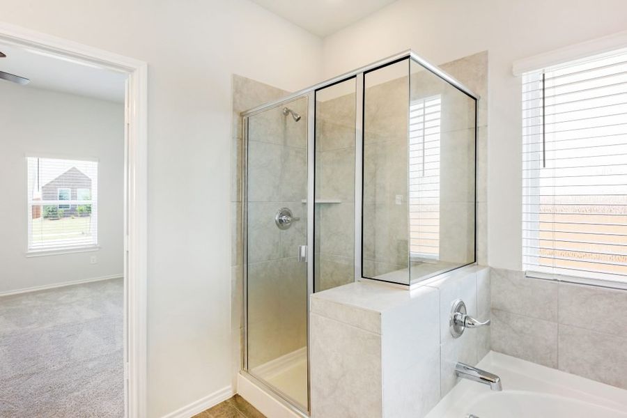 Representative exterior photo of a completed home built from the Lockhart by Impression Homes in Heartland, Heartland, TX (Image 22).